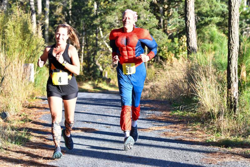 Jen Ward (2:00.6) and Mike Piorkowski (1:55:19) out on the trail.