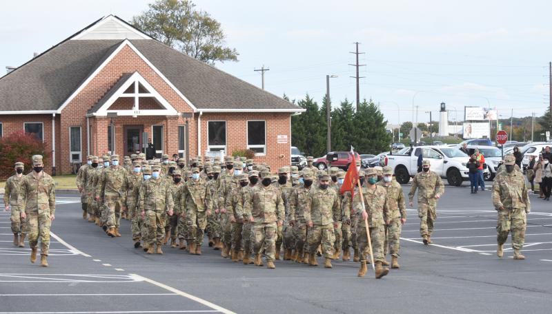 The 946th Transportation Company marches to the buses at the end of the deployment ceremony. NICK ROTH PHOTO