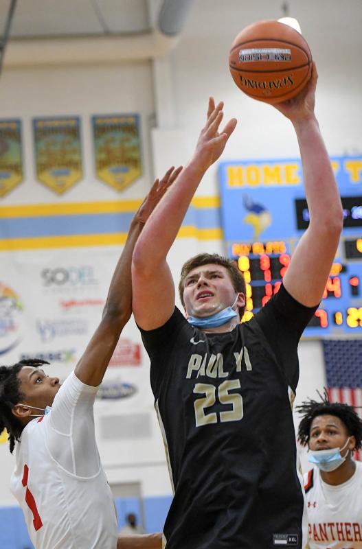 Paull VI forward Christian Gurdak hits in the paint.