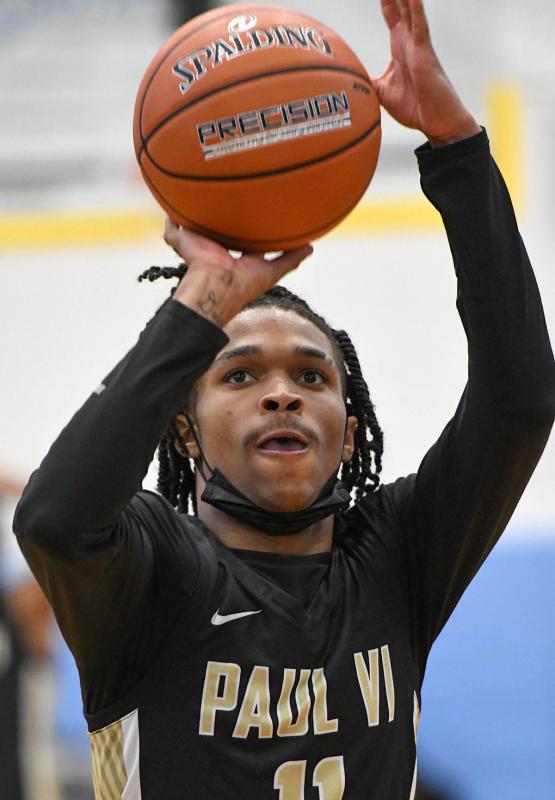 Dug McDaniel hits a foul shot for Paul VI.