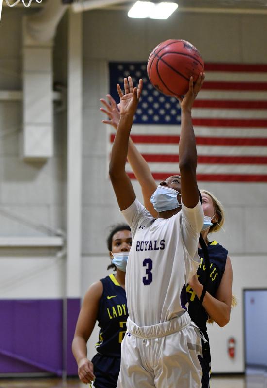 Kaela Mitchell hits for the Royals.