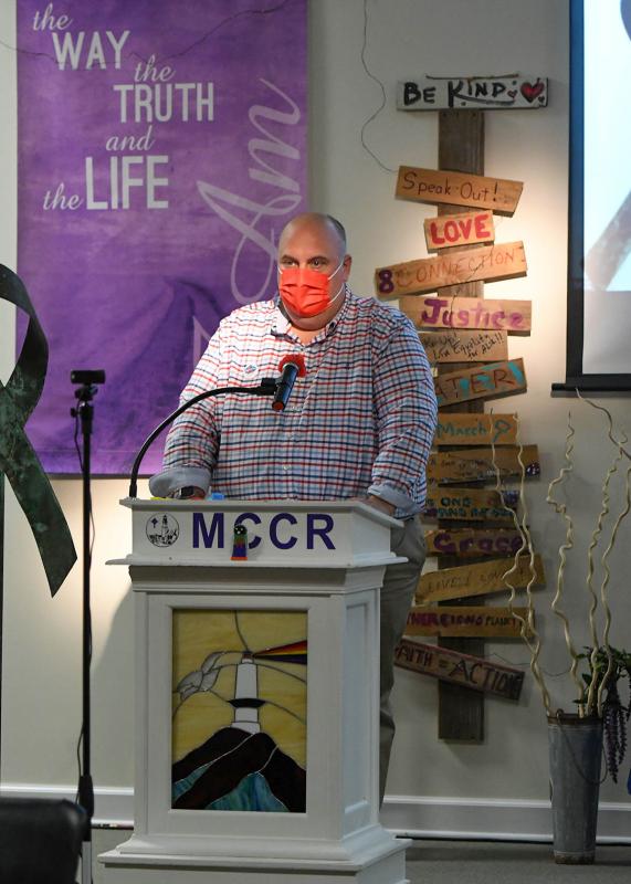 David Mariner, exectutive director of CAMP Rehoboth, welcomes the crowd gathered to observe World AIDS Day.
