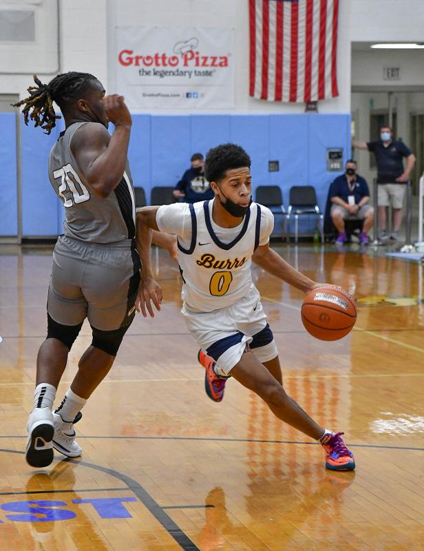 West Catholic’s Adam Clark drives to the paint in the win over Gray Collegiate.