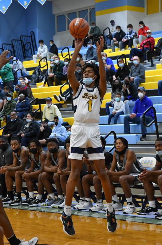 West Catholic’s Kaseem Watson hits a three.