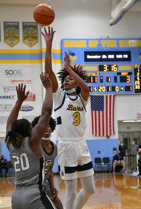 West Catholic’s Kareem Watson hits a jumper over Gray’s Tory Kelly.