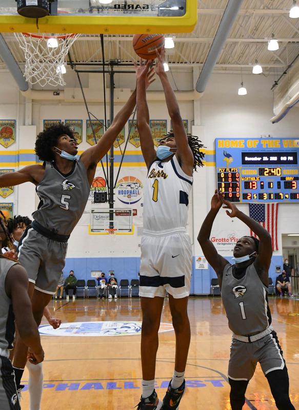 West Catholic’s Kaseem Watson gets a rebound put back.