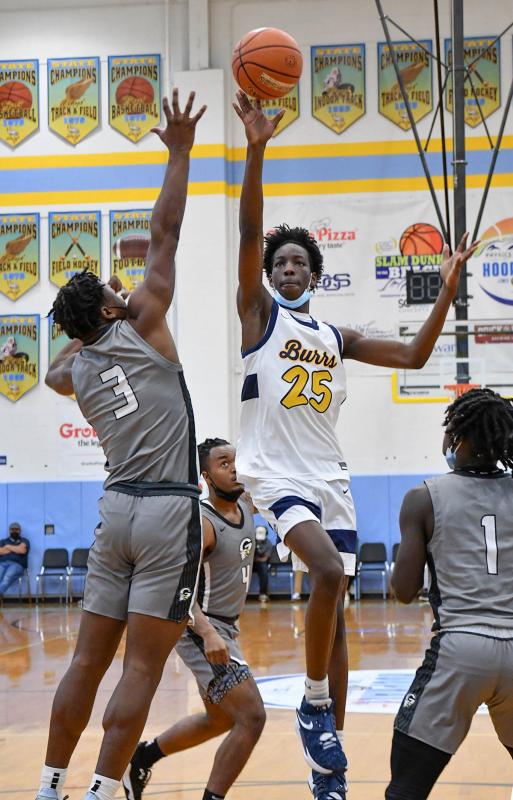 West Catholic’s Isaac Cole hits over Gray’s Clay Robinson.