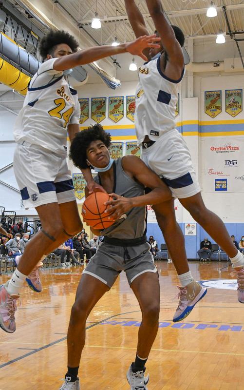Gray’s Avantae Parker is swarmed by the West Catholic defense.