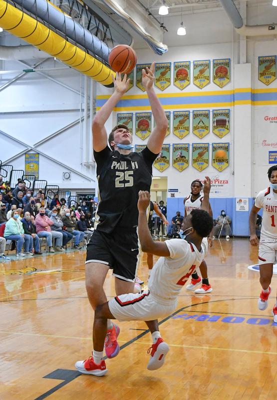 Paul VI forward Christian Gurdak gets called on the charge of charge Ronny Rapheal.