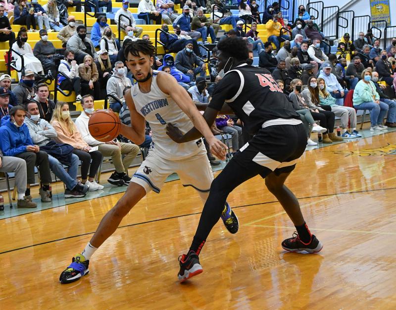 Westtown’s Dereck Lively drives on National Christian’s Moussa Ngonn.
