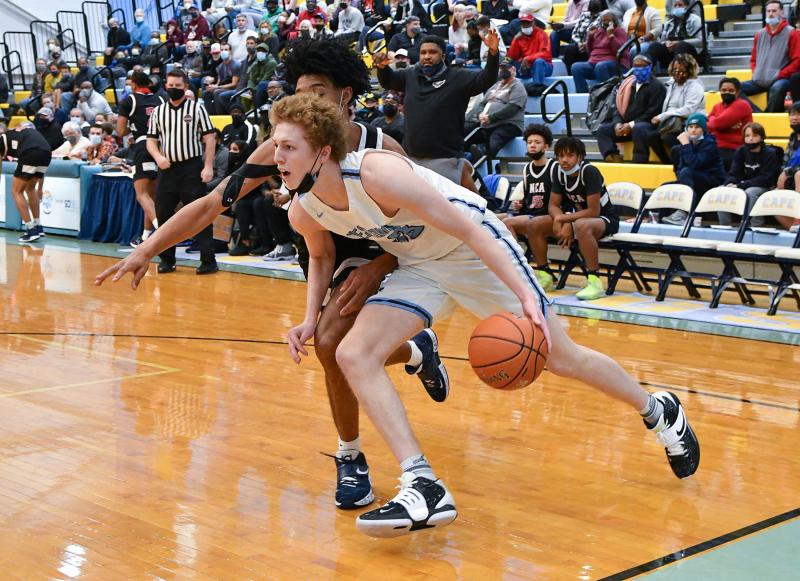 Westtown’s Mat Mayock drives baseline.