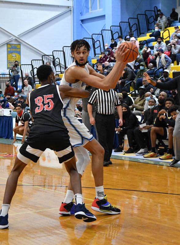 Westtown’s Dereck Lively looks to pass inside.