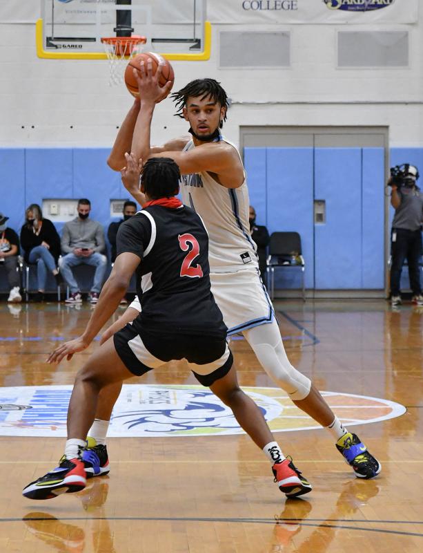 Westtown’s Dereck Lively looks over NCA’s Jaden French.