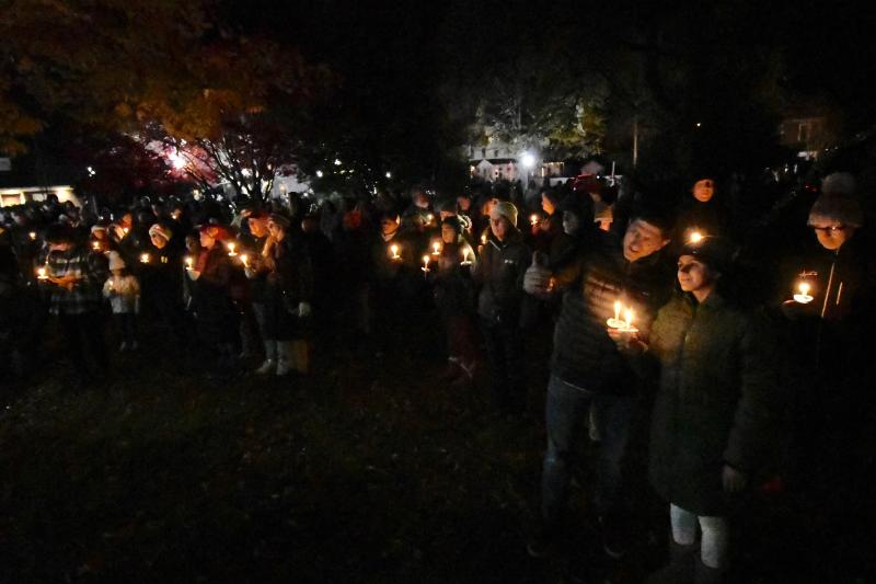 A large crowd turns out in Zwaanendael Park for the candlelight Lewes tree-lighting ceremony following the parade.