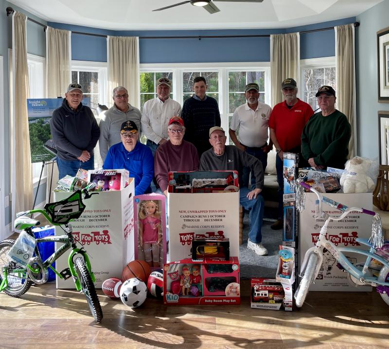Local veterans consolidating Toys for Tots donations from Insight Homes communities Baylis Estates and Hawthorne are in back (l-r) Bob Castellana, Army; David Davis, Naval Air Reserve; Ernie O’Keefe, Marines; David Gley, Air Force; Ken White, Army; Terry Shay, Marines; and George Harlin, Navy. In front are Wayne Malone, Army; Butch Crismond, Marine Corps; and Ed Farron, Army. SUBMITTED PHOTO
