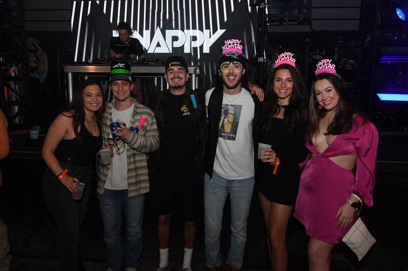 Revelers at the Bottle & Cork are (l-r) Rachel Ewald, Josh Davis, Alex Browning, Michael DiNardo, Nina Giakas and Lauren Desmond.