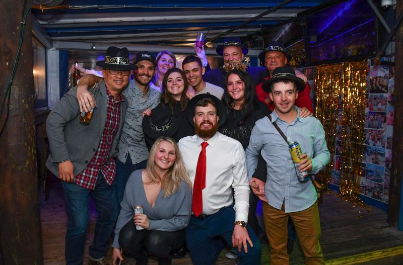 Ringing in the new year at the Starboard, in back, are (l-r) Keith Keomanikhoth, Nick Lapalombara, Marie Lapalombara, Scott Ciabatoni and Joe Lapalombara. In the middle are Jessica McCormick, Dylan McCormick, Alexis Lapalombara and Andrew Berardicelli. In front are Alicia Lapalombara and David Rholetter.