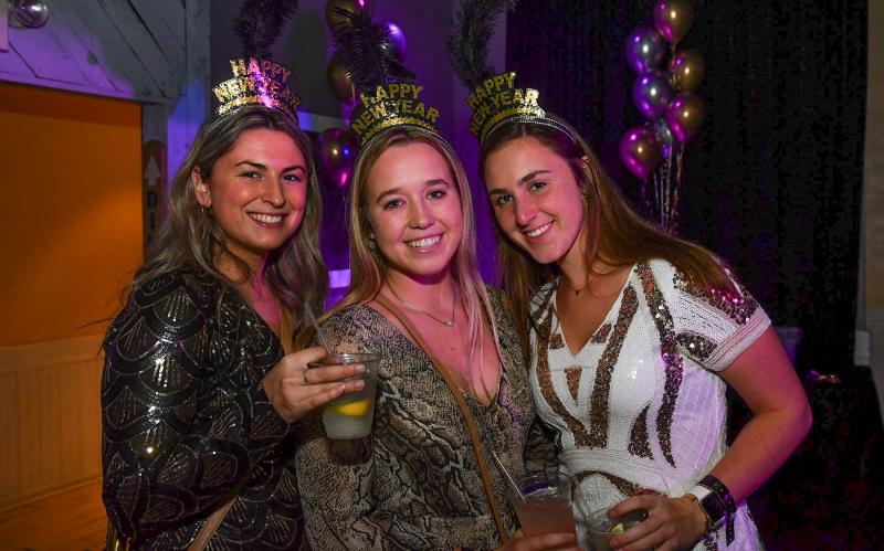 Enjoying the New Year’s Eve party at the Rusty Rudder are (l-r) Tori Sebastion, Sydney Yanick and Gabby Young.