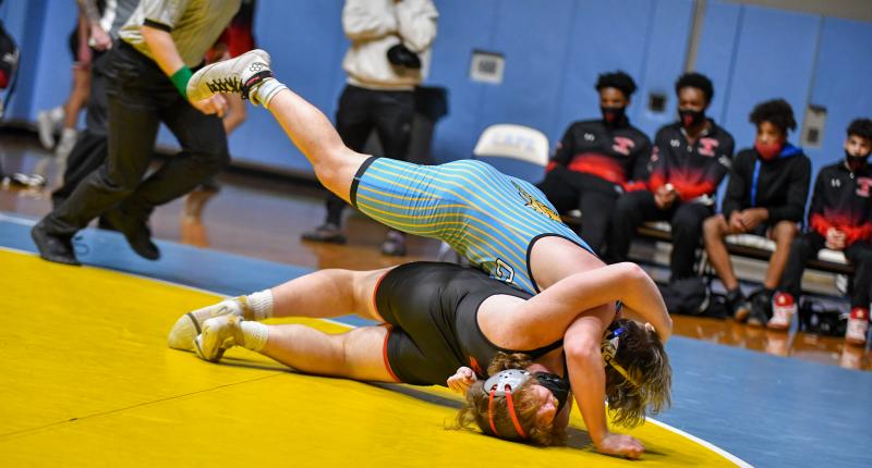 Dalton Deevey takes down Connor Bartlett at 220 pounds. DAVE FREDERICK PHOTOS