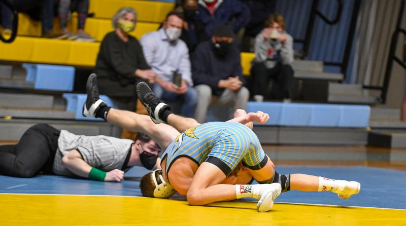 Holt Baker pins Elliott Miller at 120.