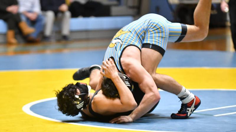 Mikey Frederick takes down Anthoni Torres in the 145-pound match.
