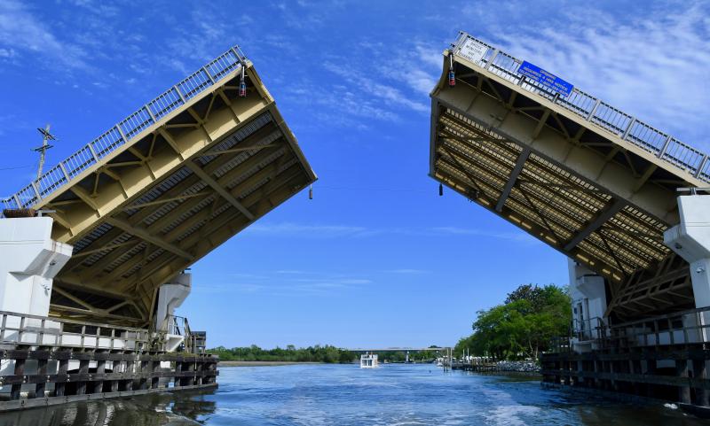 The long-awaited dredging of the Lewes-Rehoboth Canal from Delaware Bay to Rehoboth Bay is on the Army Corps of Engineers’ 2022 schedule. The Lewes drawbridge across the canal is shown opening to let a houseboat pass through.
