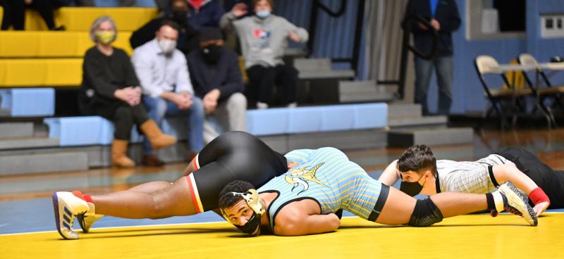 Alex Taylor closes with a pin over Dion Alston in the 195-pound match.