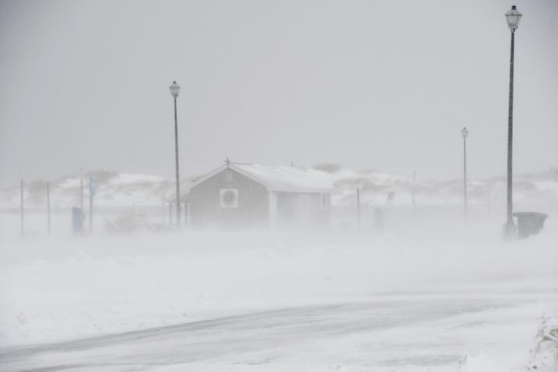 You can barely see the Lewes Lions Club beach shack with blowing snow crossing the parking lot. RON MACARTHUR PHOTO