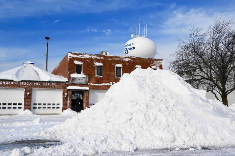 Piles of snow like this one on Rehoboth Avenue in front of Rehoboth Beach Volunteer Fire Co. will probably be around for days. RON MACARTHUR PHOTO
