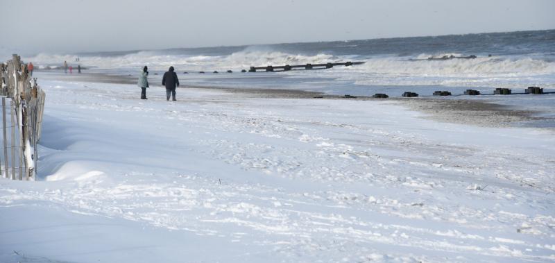 It’s not a great beach day, but it’s worth the trip to see snow on Rehoboth Beach. RON MACARTHUR PHOTO