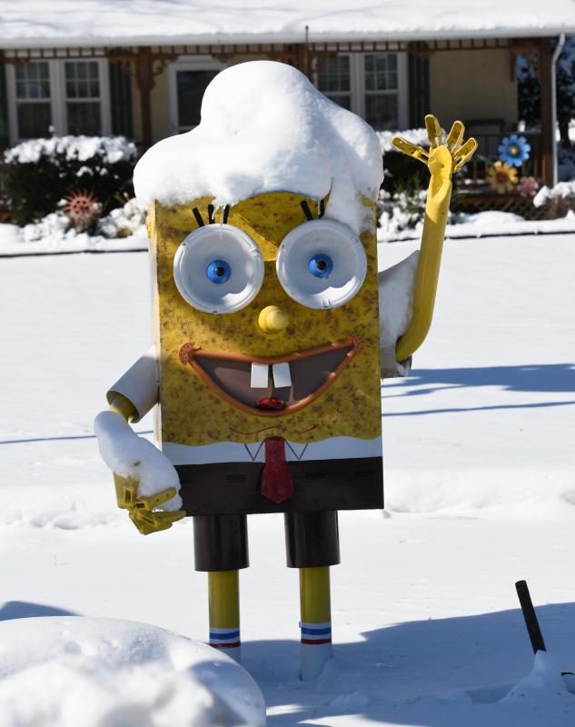 SpongeBob wears a cap of snow in the front yard of the Hagens on Route 24 in Long Neck. RON MACARTHUR PHOTO