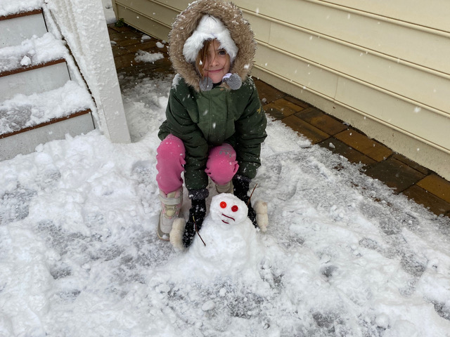 Lily Barrett enjoyed making a mini-snowman on her grandparents’ back patio in Marty Barrett’s photo.