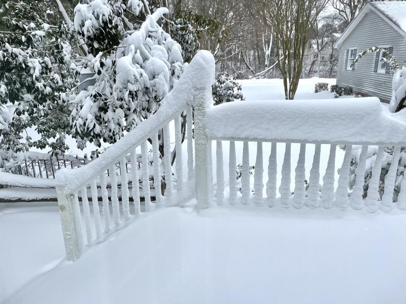 Snow piled on this deck railing in Lewes shows that about 12 inches fell during the storm. RON MACARTHUR PHOTO