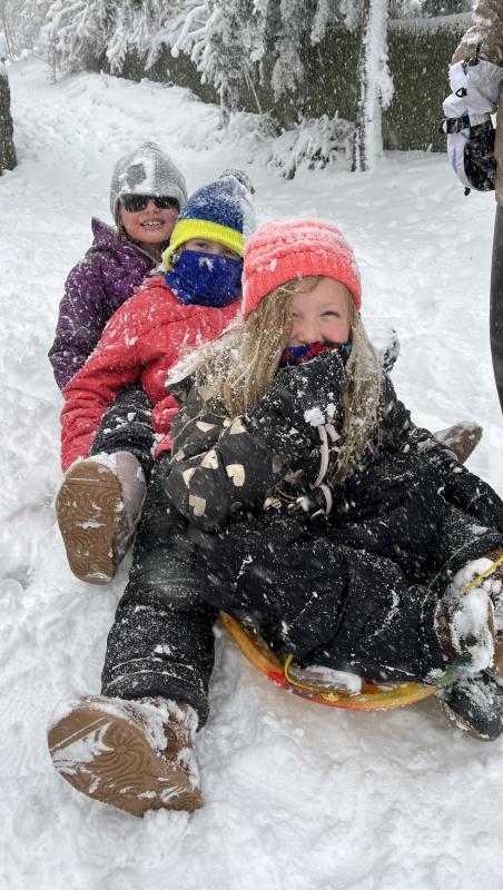 Shown (l-r) are Manning, Mackenzie, and Madden Bean, ready to blaze down a snow-covered hill in Milton in Corbin Bean’s photo.