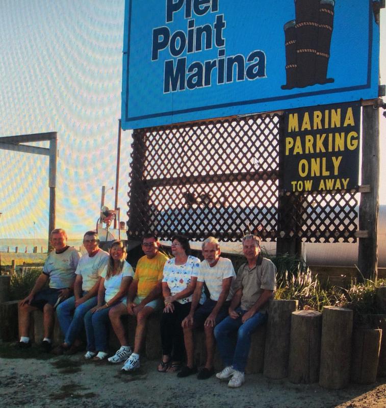 Siblings (l-r) Ronald McKinney, Donald McKinney, Marty Karlik, Charles McKinney Jr., Carla Rickards, Eugene Illian and Homer Illian enjoyed thousands of sunsets over Rehoboth Bay during their days at Pier Point Marina. MCKINNEY FAMILY PHOTO
