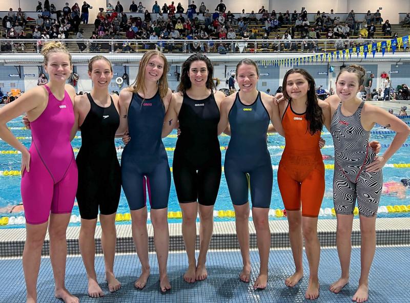 Cape swimmers at the DIAA Championships are (l-r) Jenna Reinhold, Anna Sullivan, Heidi Simmons, Sophie Schoenfeld, Gabby Robertson, Alissa Silva and Hailey Hassell. SUBMITTED PHOTO