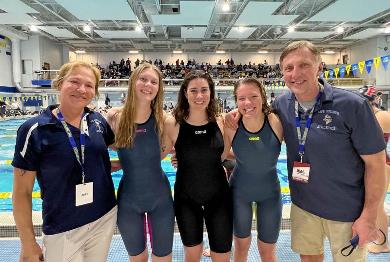 Cape seniors pose with their coaches at the DIAA Swim Championships. Shown are (l-r) coach Tina Nigh, Heidi Simmons, Sophie Schoenfeld, Gabby Robertson and head coach Bill Geppert. SUBMITTED PHOTO