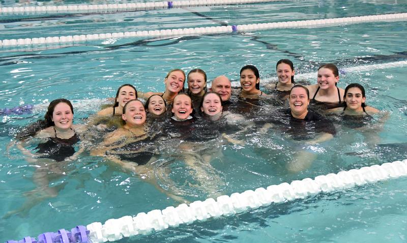 The Seahawks girls’ squad celebrates their regular-season conference title by taking a plunge with the coaching staff. In back are (l-r) Megan Raines, Eve Mundok, Elle McKay, Addison McKay, head coach Tom Martiner, Itzel Gomez Sanchez, Lyla Baker and Zoe Musil. In front are Sanne Elling, Victoria Evans, Leni Kuska, Gracie Maughan, assistant coach Stephaine Hartsoe and Kimia Langroudi.