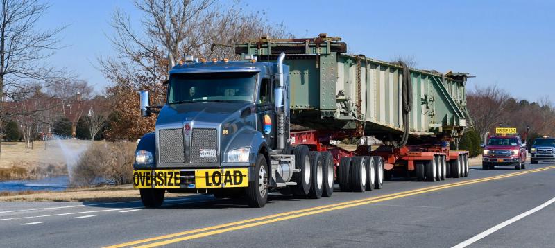 More than a few motorists’ heads turned as they saw the Lewes swing bridge being transported along Gills Neck Road on the first leg of its short journey to a permanent display area.