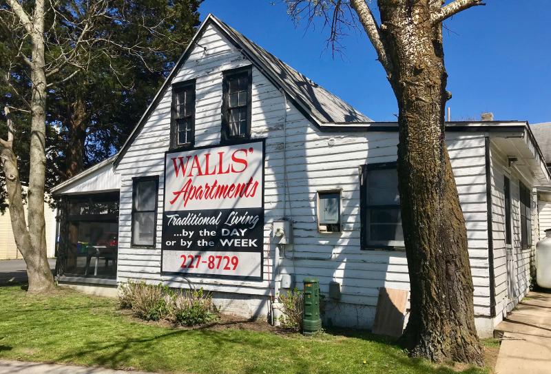 Beneath that Walls’ Apartments sign is the oldest house in Rehoboth Beach, the Lorenzo Dow Martin House, located at the corner of Christian Street and Scarborough Avenue. DENNIS FORNEY PHOTO