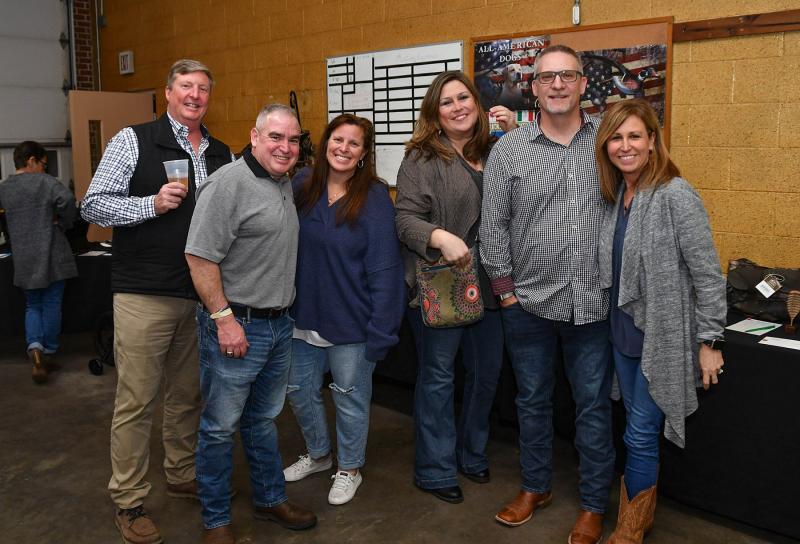Enjoying the evening are friends (l-r) Rob Medd, Thad and Bonnie Truitt, Kelly Widdoes and Fred and Nicole Best.