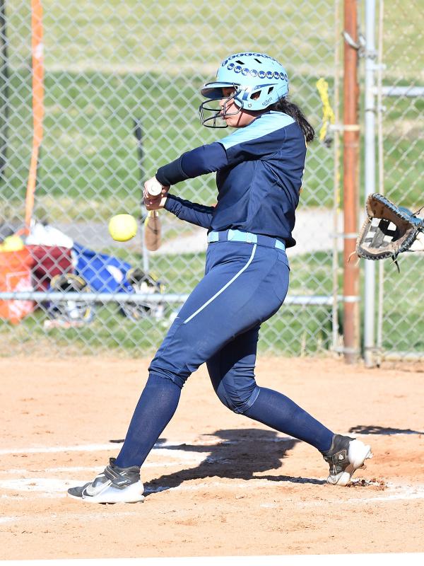 Cape catcher Jay'Lyn Slater gets one of the Vikings’ hits in the game.