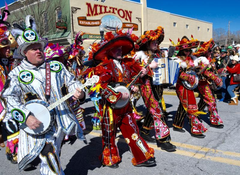 The Durning String Band, participants in the Philadelphia Mummer’s Day Parade since 1935, delights the large crowd on Union Street during the 14th annual Milton St. Patrick’s Day Parade.