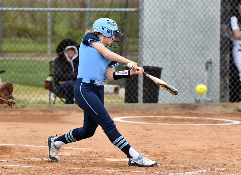 Cape freshman Ava Calciano slams a hit to left to knock in two runs.