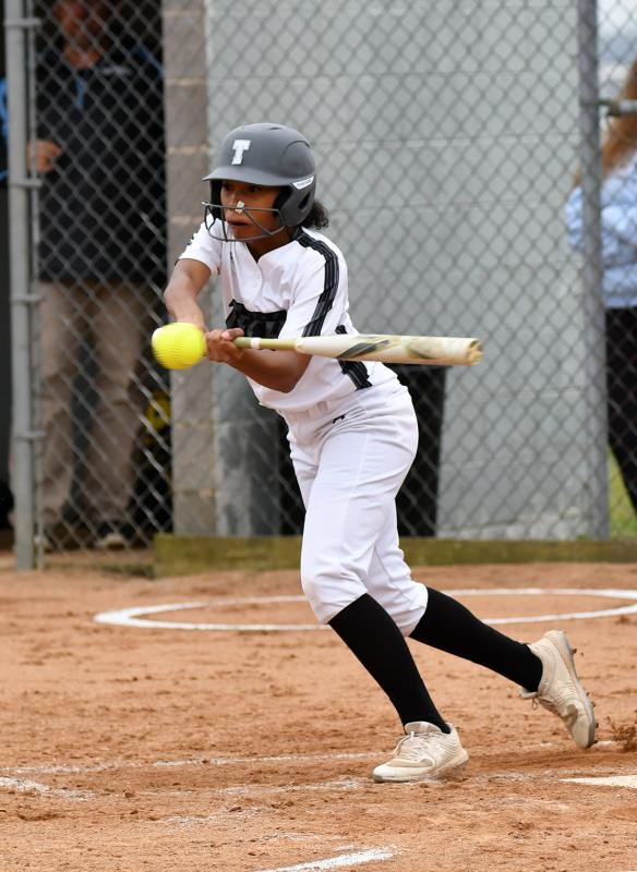 Tech’s Destiny Mitchell slaps a ball to the left side.