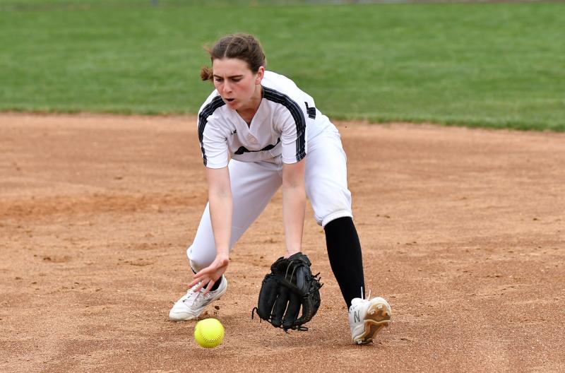 Chloe Warrington scoops up a ball for the Ravens.