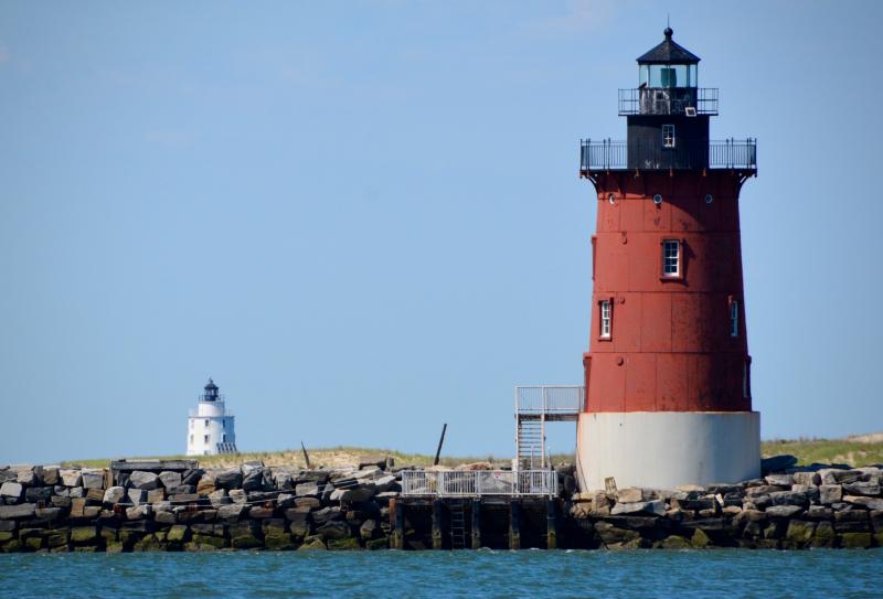 Standing on the fishing pier, you can see both lighthouses – the Harbor of Refuge (white) and Delaware Breakwater East End (red).