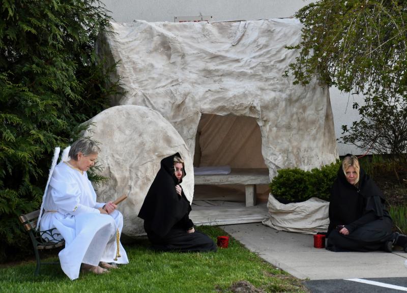 On Palm Sunday, April 10, members of Long Neck Methodist Church offered a six-scene walking tour recounting the Bible story of the death and resurrection of Jesus. His tomb is empty, as resurrection is the true meaning of the Christian Easter story. At the tomb are (l-r) Jacki Maxwell, Tara Summers-Strong and Robin Griffin. RON MACARTHUR PHOTOS