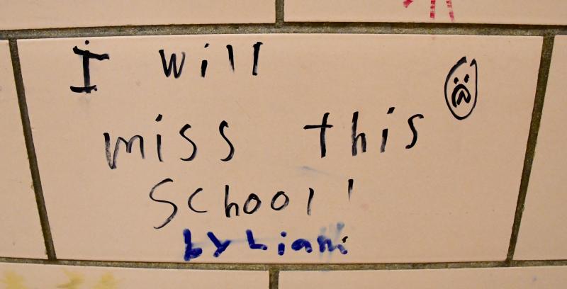 A student expresses the sentiments of many as on the last day at Shields Elementary, which has been open since 1967.