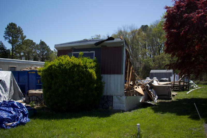 A recently demolished home the HOA president said was told had permits for window and siding work only.